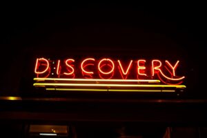 a lit signage of the word, 'DISCOVERY'